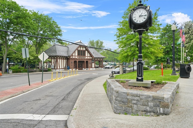 100 E Hartsdale Ave Unit Tfw, Hartsdale, NY 10530 - view of asphalt street featuring sidewalks, traffic signs, street lighting, and curbs