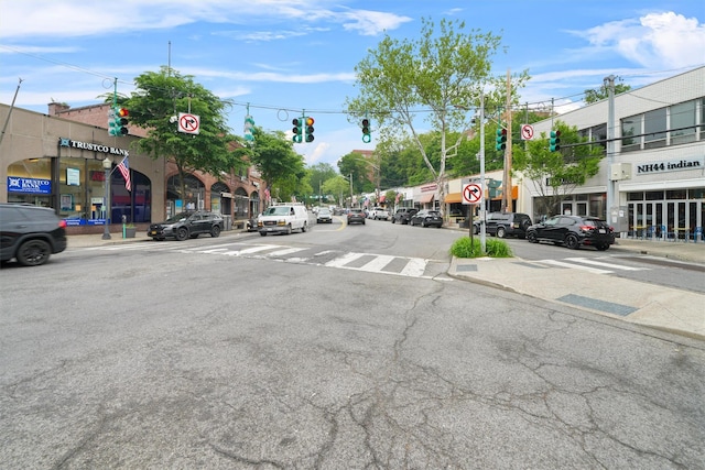 100 E Hartsdale Ave Unit Tfw, Hartsdale, NY 10530 - view of asphalt road with traffic lights, sidewalks, traffic signs, curbs, and street lighting