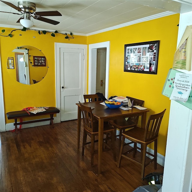 27 Coolidge Ave, Amityville, NY 11701 - dining area featuring ornamental molding, ceiling fan, and hardwood / wood-style flooring