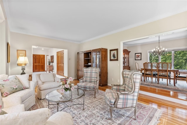47 Londonderry Ln, Somers, NY 10589 - living area with a chandelier, light wood-type flooring, crown molding, and baseboards