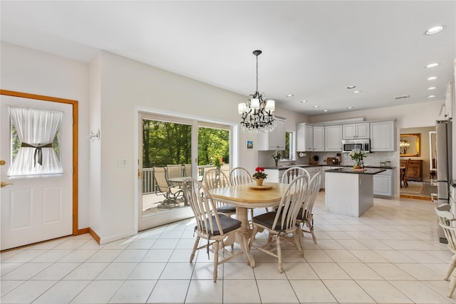 47 Londonderry Ln, Somers, NY 10589 - dining room featuring a chandelier, recessed lighting, light tile patterned floors, and baseboards