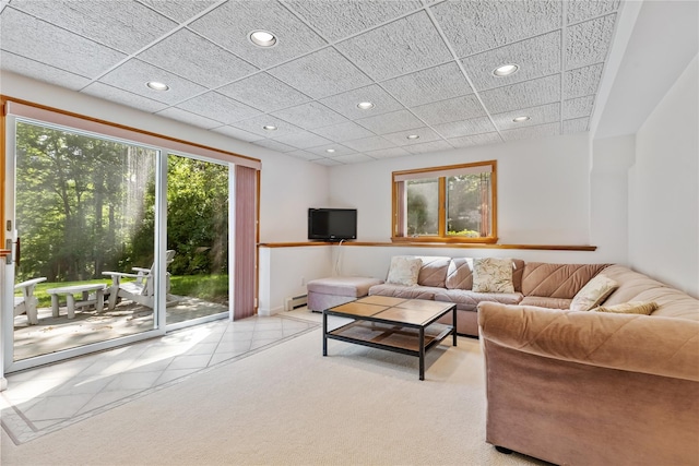 47 Londonderry Ln, Somers, NY 10589 - tiled living room featuring recessed lighting, a baseboard radiator, and carpet