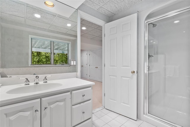 47 Londonderry Ln, Somers, NY 10589 - bathroom with a stall shower, vanity, tile patterned floors, recessed lighting, and a paneled ceiling