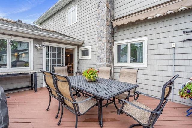 11 Fishermans Dr, Port Washington, NY 11050 - wooden deck with outdoor dining area