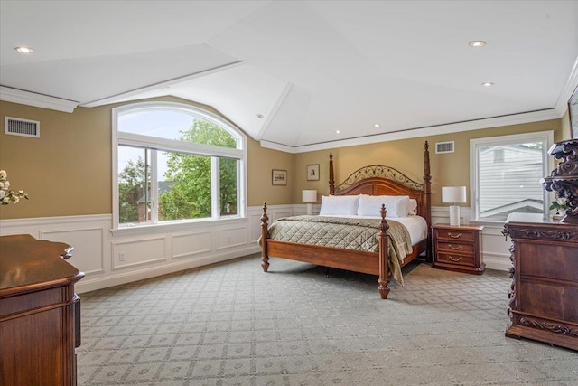 11 Fishermans Dr, Port Washington, NY 11050 - bedroom with light carpet, crown molding, lofted ceiling, wainscoting, and a decorative wall