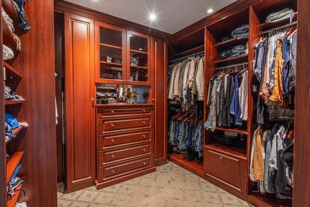 11 Fishermans Dr, Port Washington, NY 11050 - walk in closet with light colored carpet