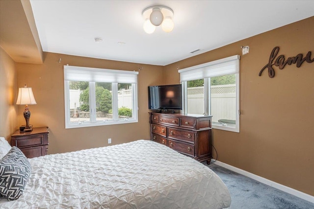 11 Fishermans Dr, Port Washington, NY 11050 - bedroom featuring carpet floors and baseboards