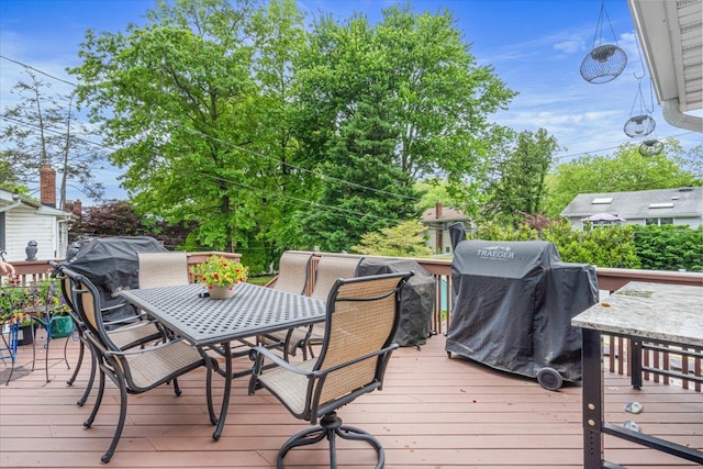11 Fishermans Dr, Port Washington, NY 11050 - wooden terrace featuring outdoor dining space and area for grilling