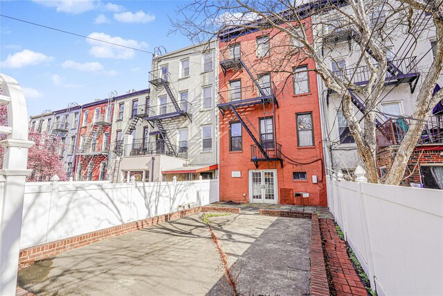 146 Nelson St, Brooklyn, NY 11231 - rear view of house featuring fence and french doors