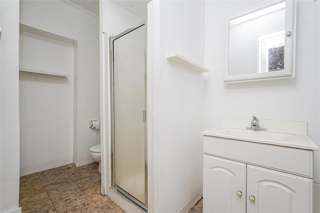 146 Nelson St, Brooklyn, NY 11231 - bathroom featuring toilet, a stall shower, vanity, baseboards, and stone finish floors