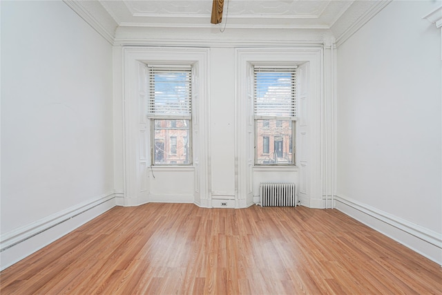 146 Nelson St, Brooklyn, NY 11231 - empty room with radiator heating unit, light wood finished floors, plenty of natural light, and crown molding
