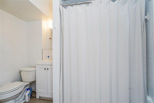 146 Nelson St, Brooklyn, NY 11231 - bathroom featuring toilet, vanity, and a shower with curtain
