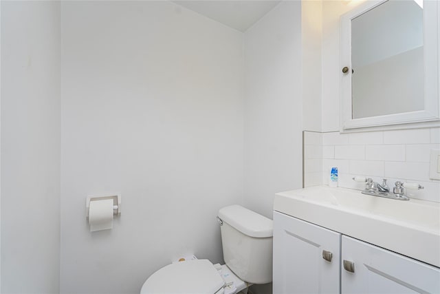 146 Nelson St, Brooklyn, NY 11231 - half bathroom featuring decorative backsplash, toilet, and vanity