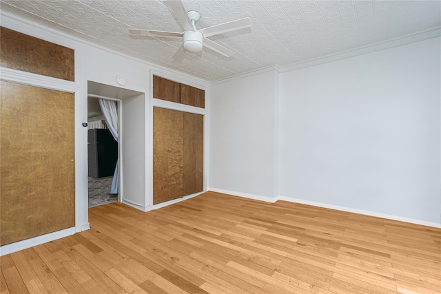 146 Nelson St, Brooklyn, NY 11231 - unfurnished room featuring hardwood / wood-style floors, ornamental molding, a ceiling fan, an ornate ceiling, and baseboards