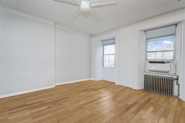 146 Nelson St, Brooklyn, NY 11231 - empty room with radiator heating unit, light wood-style floors, plenty of natural light, and crown molding
