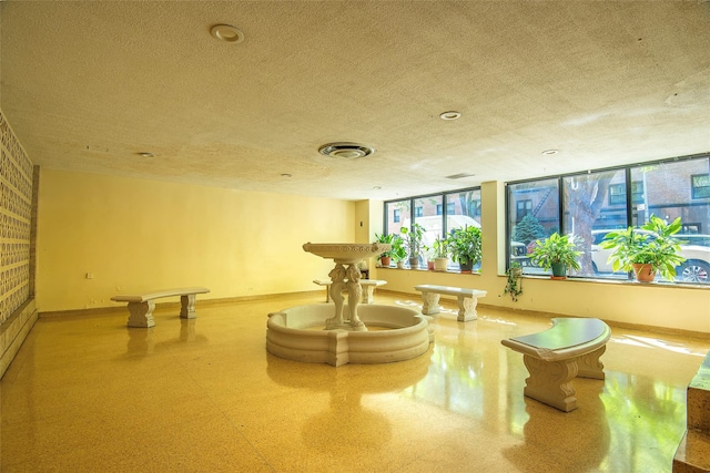 99-35 59th Ave Unit 4K, Corona, NY 11368 - community lobby featuring a textured ceiling
