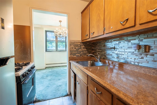 99-35 59th Ave Unit 4K, Corona, NY 11368 - kitchen with a baseboard heating unit, gas stove, a sink, brown cabinetry, and light colored carpet