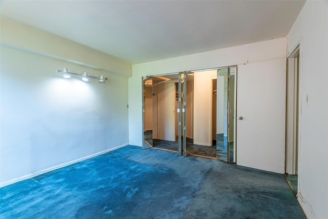 99-35 59th Ave Unit 4K, Corona, NY 11368 - unfurnished bedroom featuring carpet floors