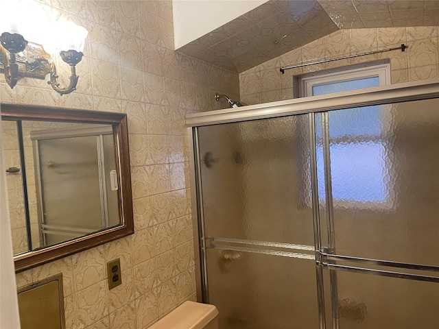 118-52 227th St, Cambria Heights, NY 11411 - bathroom featuring an enclosed shower and vaulted ceiling