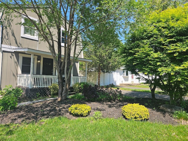 15 Ormond Ave, Selden, NY 11784 - view of front of home featuring a porch