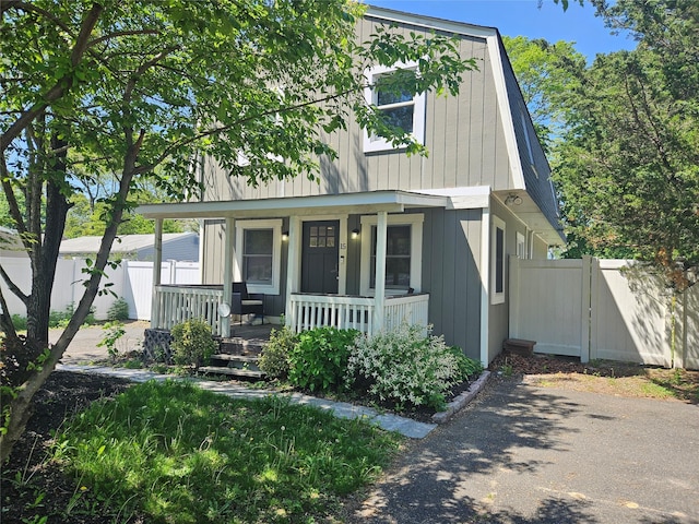 15 Ormond Ave, Selden, NY 11784 - view of front of house featuring covered porch and fence