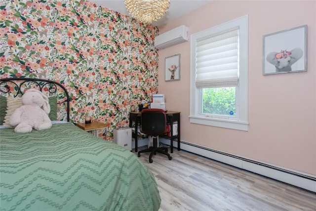 bedroom with a wall mounted AC, wood finished floors, baseboard heating, and a chandelier