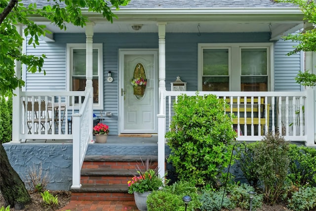 entrance to property with a porch