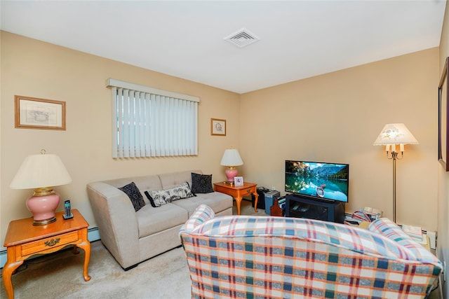 carpeted living room with a baseboard heating unit