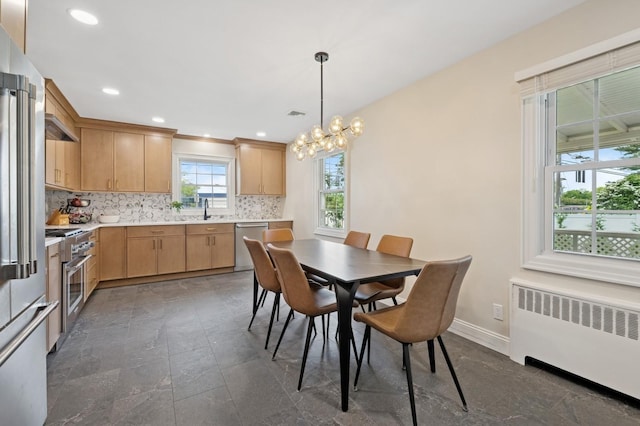 40 Grafton St, Greenlawn, NY 11740 - dining room with radiator, a chandelier, baseboards, and recessed lighting