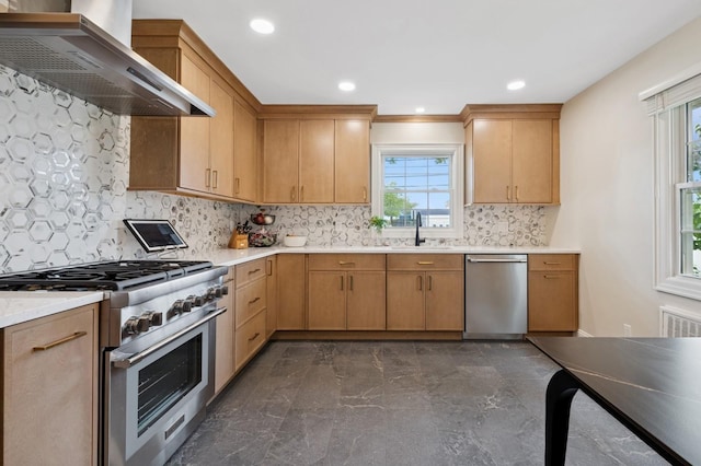 40 Grafton St, Greenlawn, NY 11740 - kitchen featuring appliances with stainless steel finishes, wall chimney range hood, a sink, light countertops, and decorative backsplash