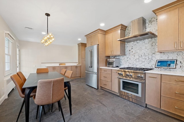40 Grafton St, Greenlawn, NY 11740 - kitchen featuring wall chimney range hood, premium appliances, decorative backsplash, light brown cabinetry, and light countertops