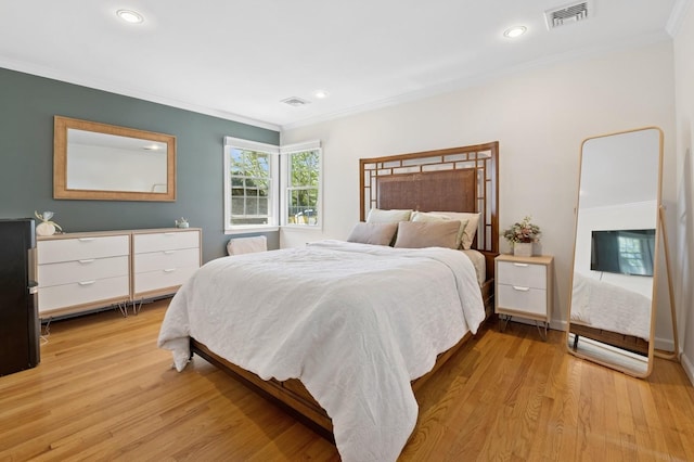40 Grafton St, Greenlawn, NY 11740 - bedroom with ornamental molding, light wood-style flooring, and recessed lighting
