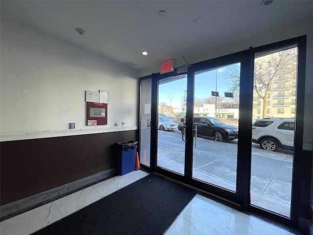 70-26 Queens Blvd Unit 10B, Woodside, NY 11377 - doorway featuring marble finish flooring and recessed lighting