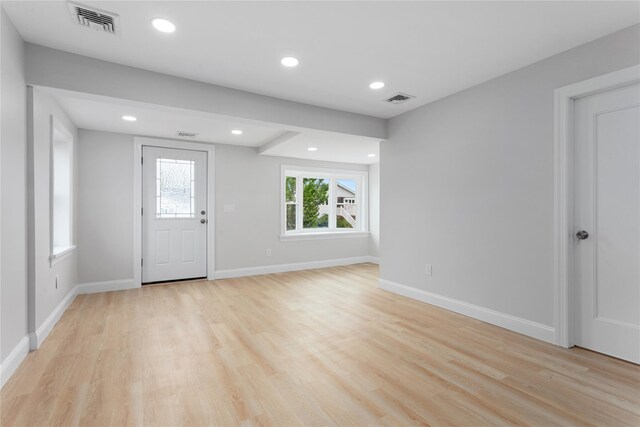 208 W Alhambra Ave, Lindenhurst, NY 11757 - entryway with light wood-style floors, baseboards, and recessed lighting