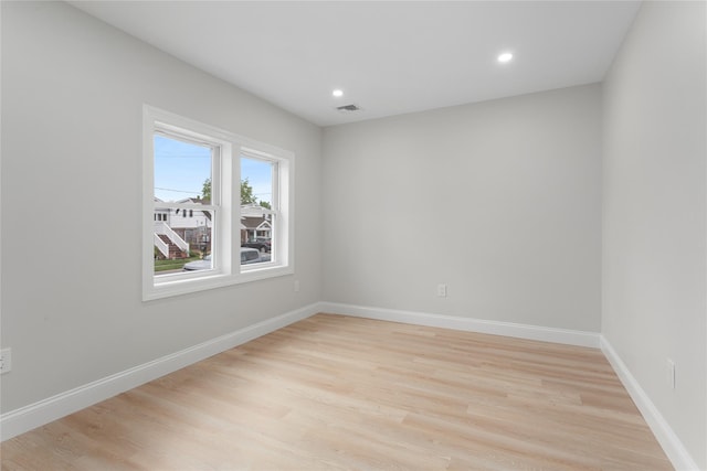208 W Alhambra Ave, Lindenhurst, NY 11757 - unfurnished room featuring light wood-style floors, recessed lighting, and baseboards