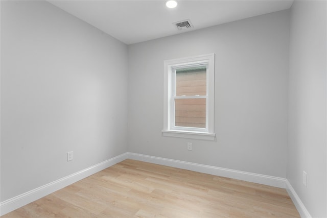 208 W Alhambra Ave, Lindenhurst, NY 11757 - spare room featuring light wood finished floors, baseboards, and recessed lighting