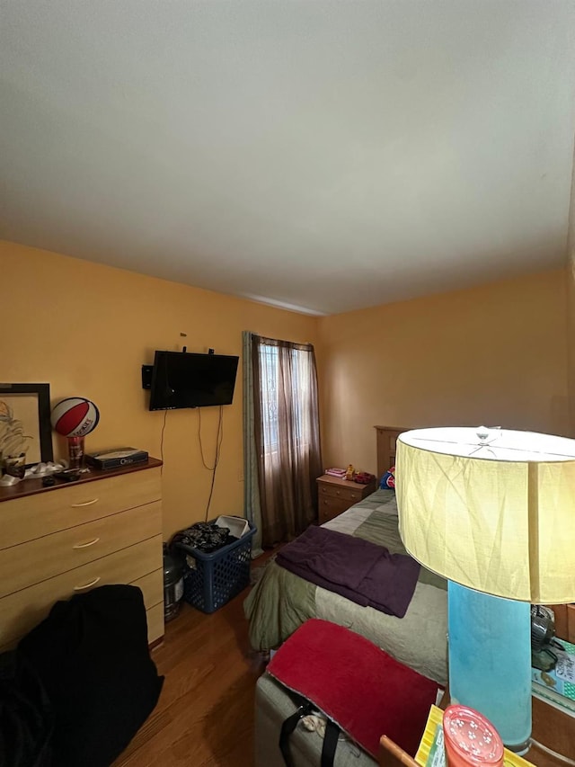 14207 135th Ave, Jamaica, NY 11436 - bedroom featuring wood finished floors