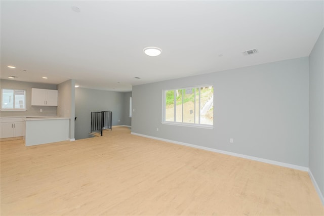 31 Cunard Ave, Staten Island, NY 10304 - unfurnished living room featuring light wood finished floors, baseboards, plenty of natural light, and recessed lighting
