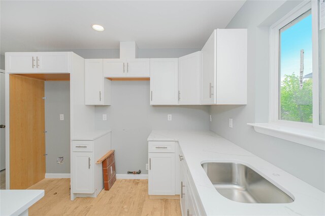 31 Cunard Ave, Staten Island, NY 10304 - kitchen featuring a sink, light wood-style floors, white cabinetry, healthy amount of natural light, and recessed lighting