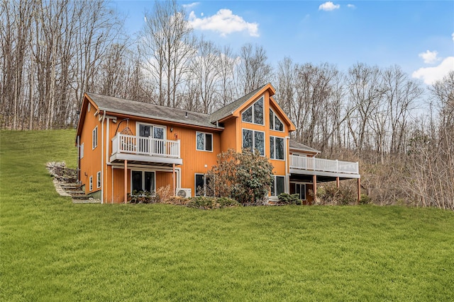 24 Babbling Brook Ln, Cold Spring, NY 10516 - back of house featuring a lawn and a deck