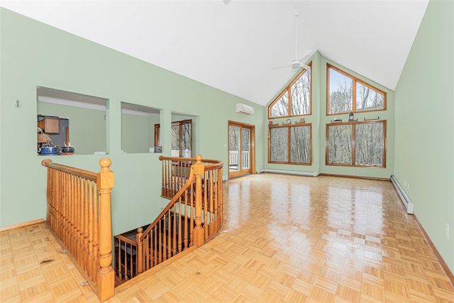24 Babbling Brook Ln, Cold Spring, NY 10516 - unfurnished room featuring a baseboard heating unit, high vaulted ceiling, baseboards, an AC wall unit, and a ceiling fan