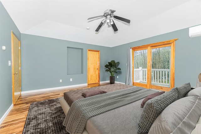 24 Babbling Brook Ln, Cold Spring, NY 10516 - bedroom featuring access to outside, wood finished floors, baseboards, an AC wall unit, and ceiling fan