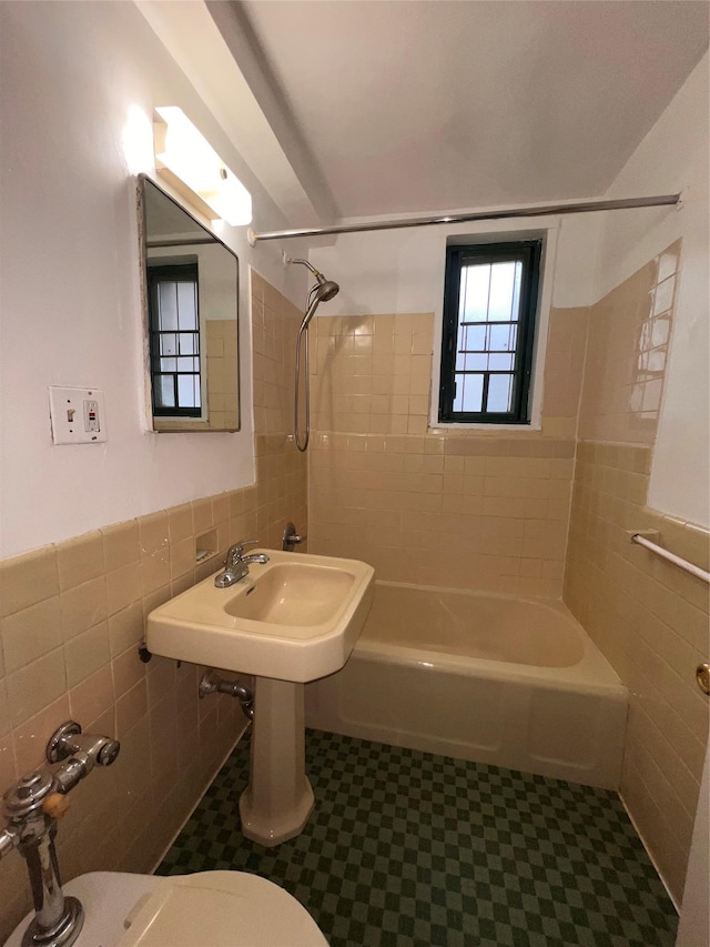 1722 Purdy St Unit Mc, Bronx, NY 10462 - bathroom with tile walls, tile patterned floors, washtub / shower combination, and wainscoting