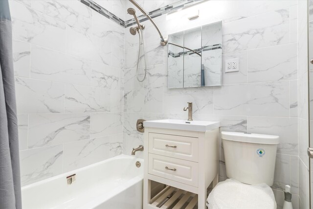 61-13 62nd St, Middle Village, NY 11379 - bathroom featuring shower / bath combo, vanity, tile walls, and toilet