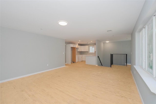 43 Cunard Ave, Staten Island, NY 10304 - unfurnished living room with light wood-type flooring, baseboards, plenty of natural light, and recessed lighting