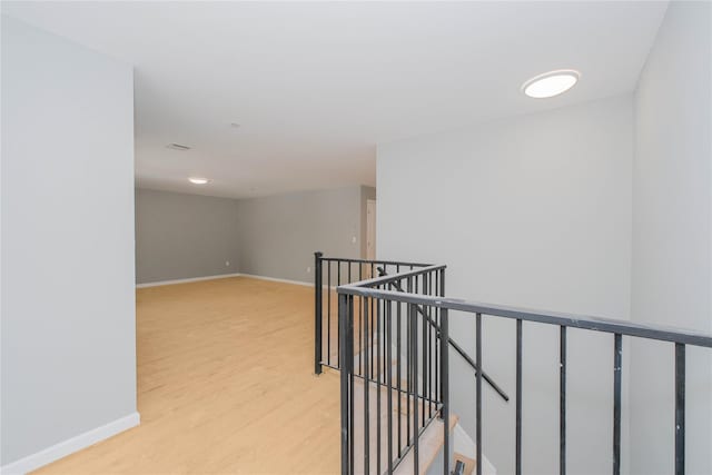 43 Cunard Ave, Staten Island, NY 10304 - hall with an upstairs landing, light wood-style flooring, and baseboards