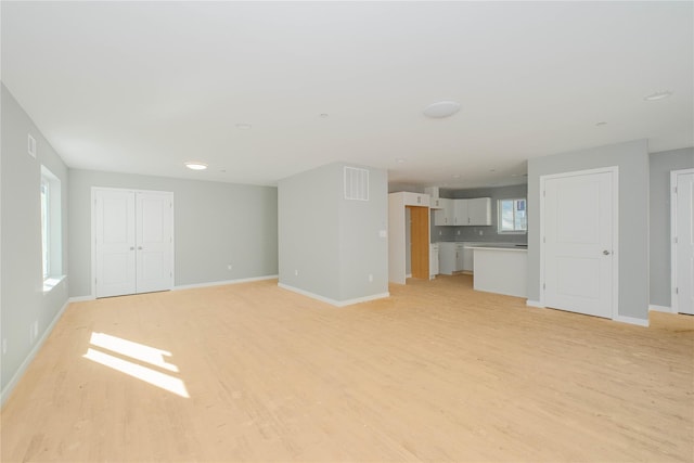 43 Cunard Ave, Staten Island, NY 10304 - unfurnished living room featuring light wood-style flooring and baseboards