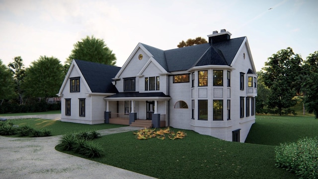 32.1 Orchard Dr, Armonk, NY 10504 - view of front facade featuring a porch, concrete driveway, an attached garage, a front lawn, and a chimney