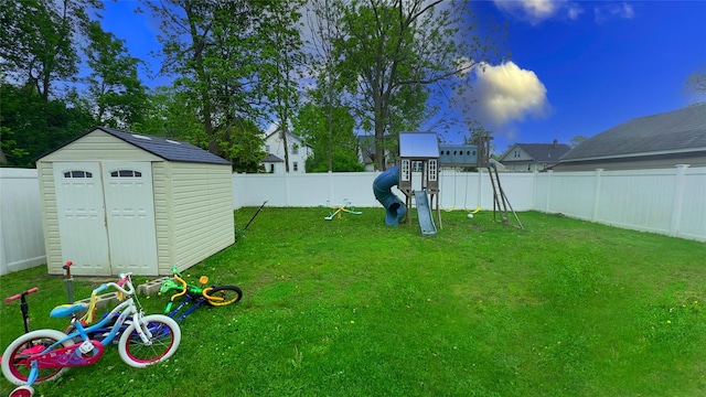 25 Center Ave, Bay Shore, NY 11706 - view of yard with a playground, a shed, and an outbuilding