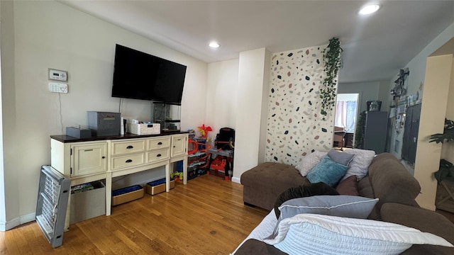 25 Center Ave, Bay Shore, NY 11706 - living room with light wood-style flooring, recessed lighting, and baseboards